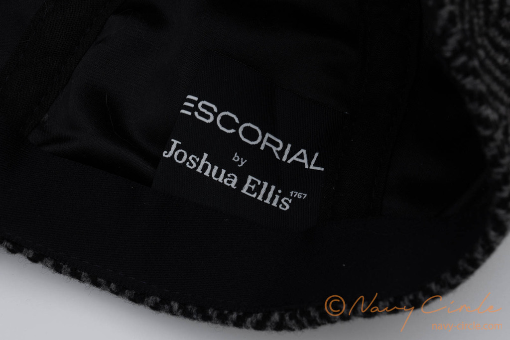 Joshua EllisとLock & Co. Hattersによるエスコリアルウールを使ったベースボールキャップ。Escorial by Joshua Ellisとあるタグ